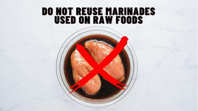 Chicken breasts in marinade with sign - Do Not Reuse Marinades Used on Raw Foods