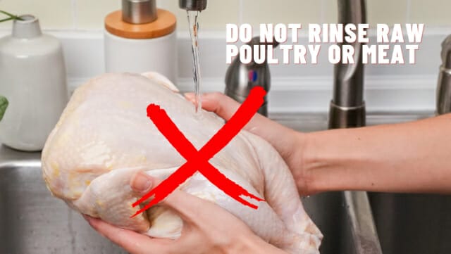 Hands washing a whole chicken in the sink with message - Do Not Rinse Raw Poultry or Meat